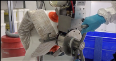ezzFAST vacuum lifter with pneumatic gripper for sack handling