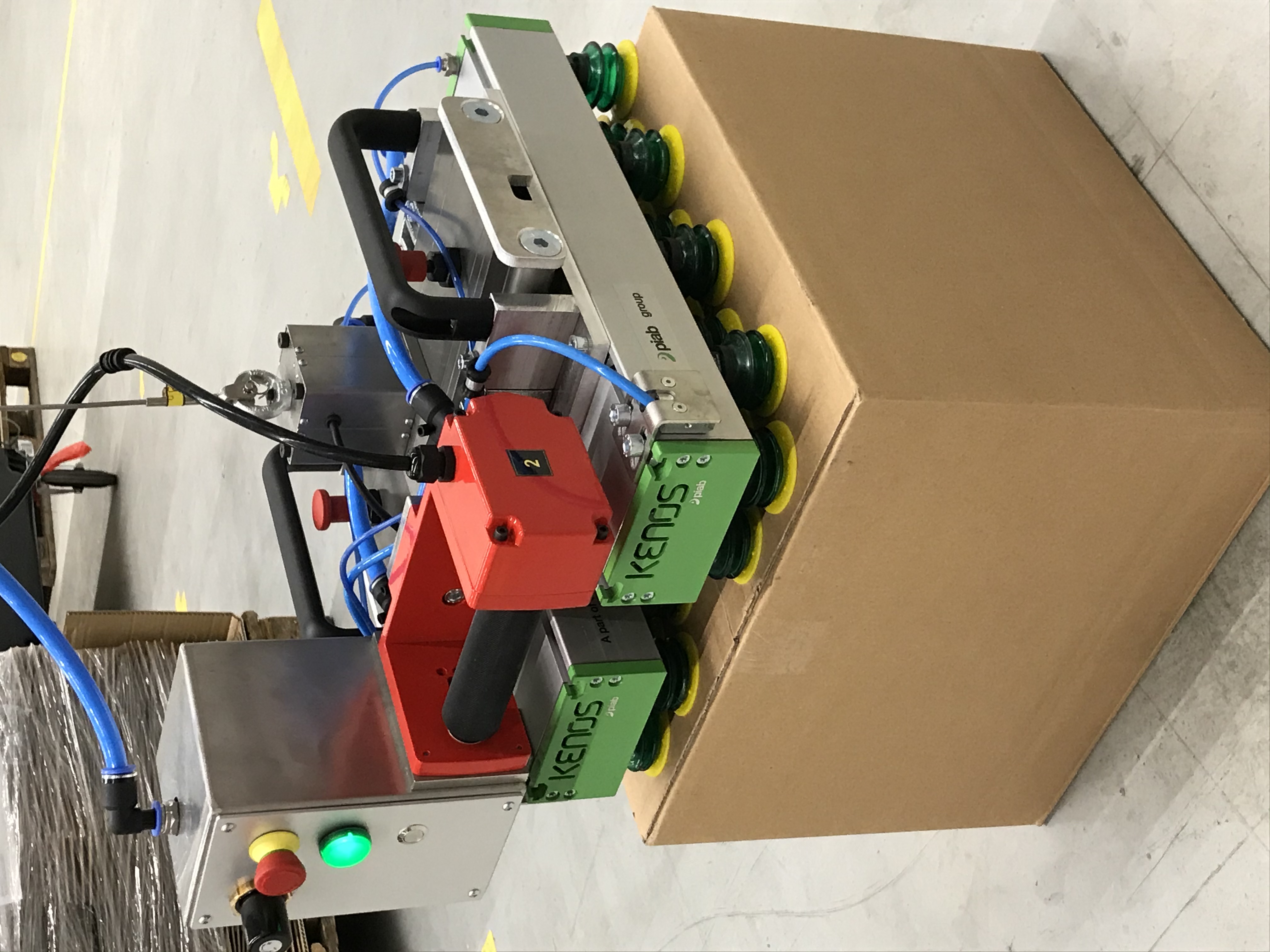 Handle boxes and crates with vacuum lifters at cycle time